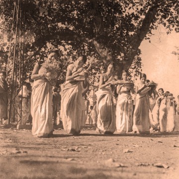 Girls dancing in a procession at Santiniketan, by Shambhu Shaha. From Faces & Places of Visva-Bharati: A Collection of Photographs, by Shambhu Shaha, 2nd edn., Visva-Bharati Publishing Department, Kolkata, 2008. Rabindra Bhavana Acc. No. SS584.