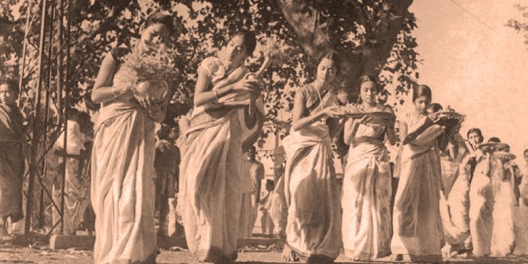 Girls dancing in a procession at Santiniketan, by Shambhu Shaha. From Faces & Places of Visva-Bharati: A Collection of Photographs, by Shambhu Shaha, 2nd edn., Visva-Bharati Publishing Department, Kolkata, 2008. Rabindra Bhavana Acc. No. SS584.