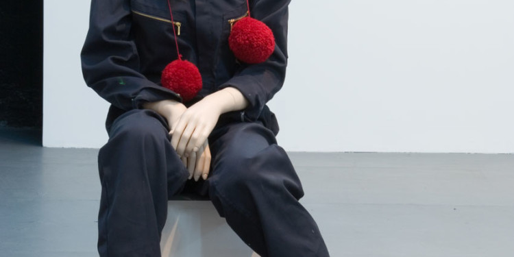 Mai-Thu Perret Donna Come Me, 2008 Mannequin, wig, uniform, pom poms and acrylic paint on carpet, wood, acrylic Carpet: 365.76 x 198.12 cm - Mannequin: 139 x 50 x 60 cm - Pedestal: 50.8 x 50.8 cm Kunstmuseum Liechtenstein, Vaduz Photo: The Kitchen, New York