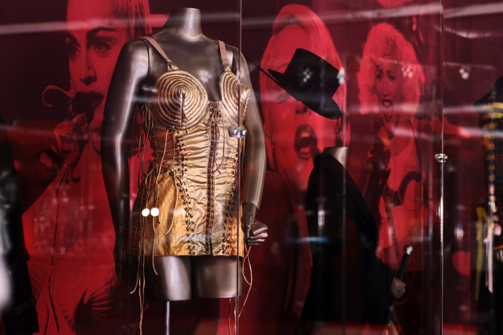Madonna - Date: 1990 Medium: Design by Jean Paul Gautier Photo: Courtesy of the Rock and Roll Hall of Fame and Museum Credit: Private collection Description: Bustier worn as part of the 1990 Blond Ambition Tour Madonna - Date: 1990 Medium: Design by Jean Paul Gautier Photo: Courtesy of the Rock and Roll Hall of Fame and Museum Credit: Private collection Description: Bustier worn as part of the 1990 Blond Ambition Tour
