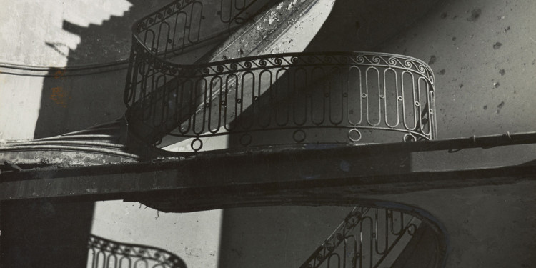 Bill Brandt. Bombed Regency Staircase, Upper Brook Street, Mayfair. c. 1942. Gelatin silver print, 9 x 7 5/8″ (22.8 x 19.4 cm). The Museum of Modern Art. Acquired through the generosity of Clarissa A. Bronfman. © 2012 Bill Brandt Archive Ltd.